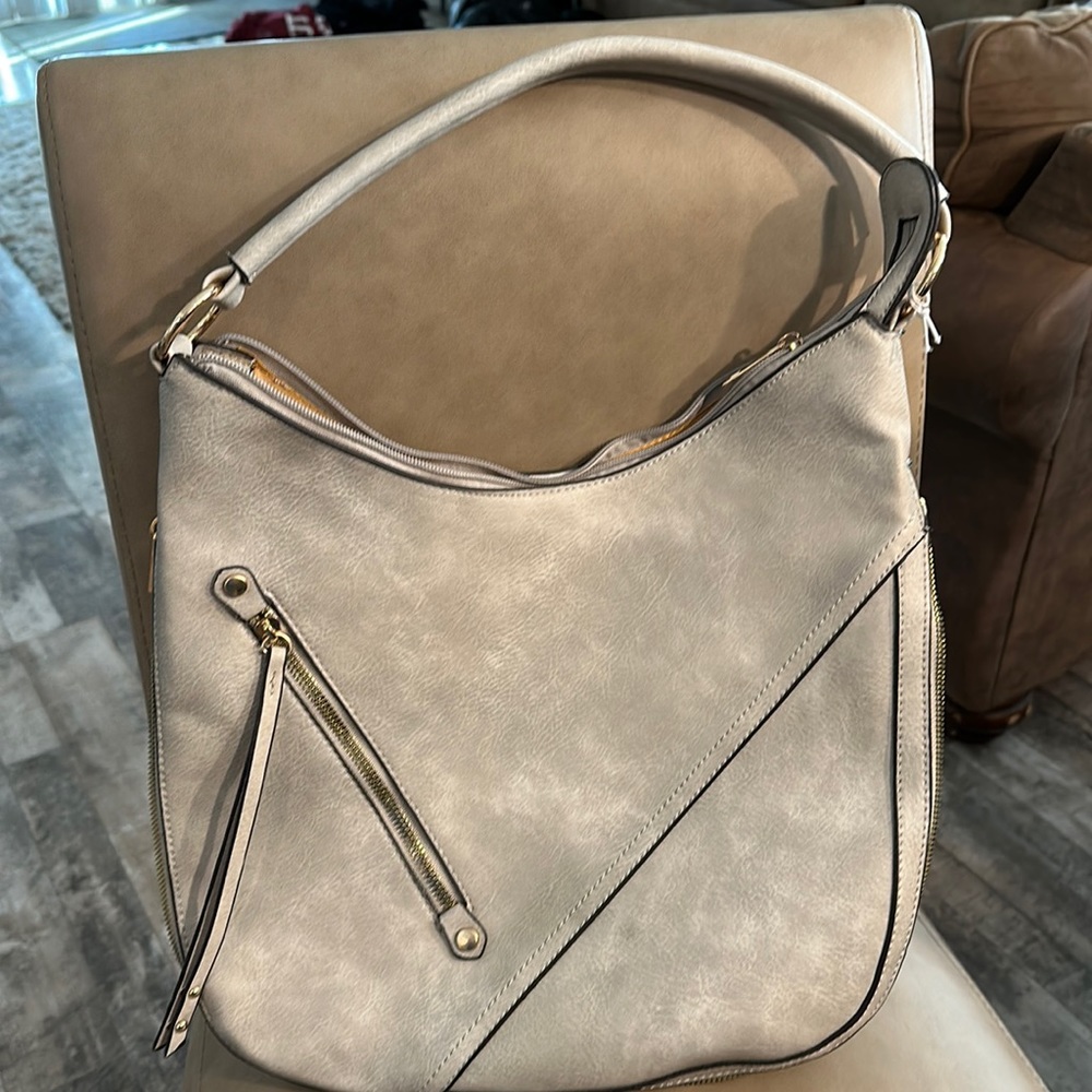 Large Gray/and leopard print woman’s purse.